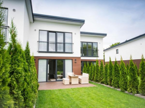 Ferienhaus mit Sauna und Jacuzzi im BALTIC VILLAGE, Damp